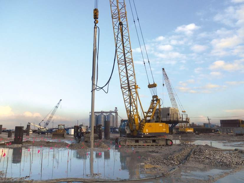 Top feed stone column — vibro replacement in cohesive soil